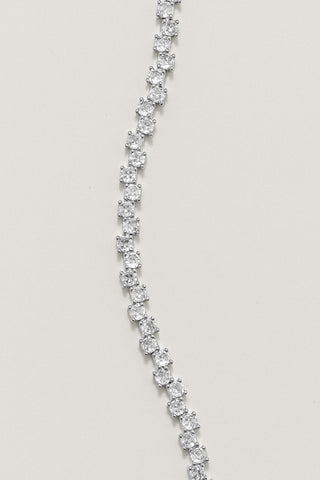 Ramona tennis bracelet, silver plated, close-up of the two staggered rows of claw-set clear stones