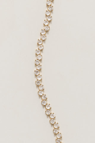 Ramona tennis bracelet, gold plated, close-up of the two staggered rows of claw-set clear stones