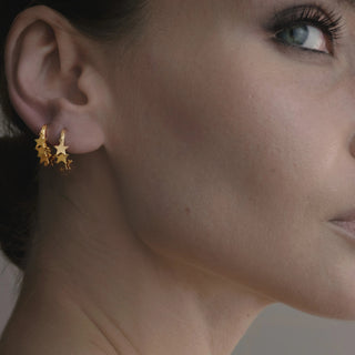Astral Star Huggie Earrings from One Dame Lane